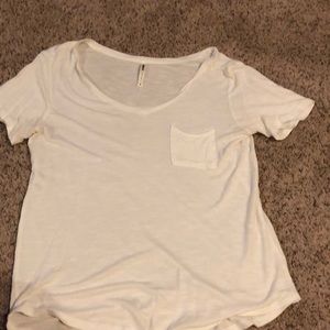 Tresics shirt. I got it from target. White shirt lose fit